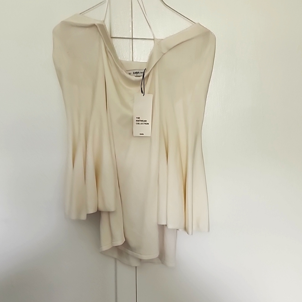 Cream off the shoulder top size L